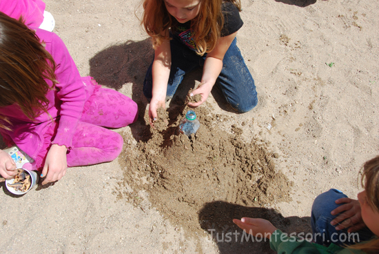 Children worked in small groups to build their volcano.