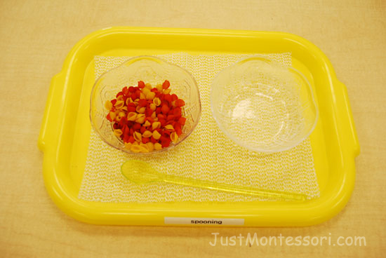 I colored mini pasta shells with food coloring as the rice above for a spooning exercise. 