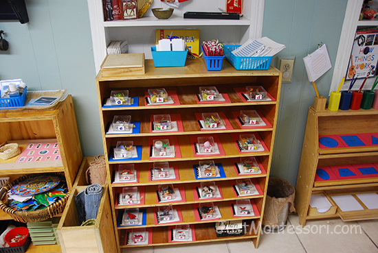 Letter Sound Shelf (shows coffee tray, necklaces, and letter tracing pages)